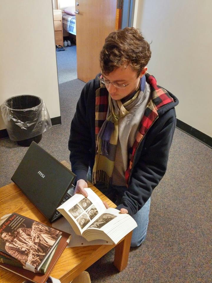 Clark University Student Grant Henry works on Worcester Art Museum Cyanotypes